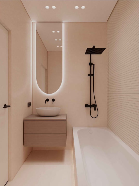 Bathroom with a freestanding bath and a rain shower