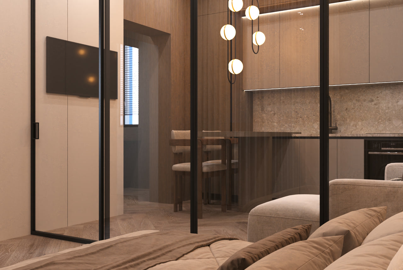 Bed with the kitchen-living area behind glass partitions