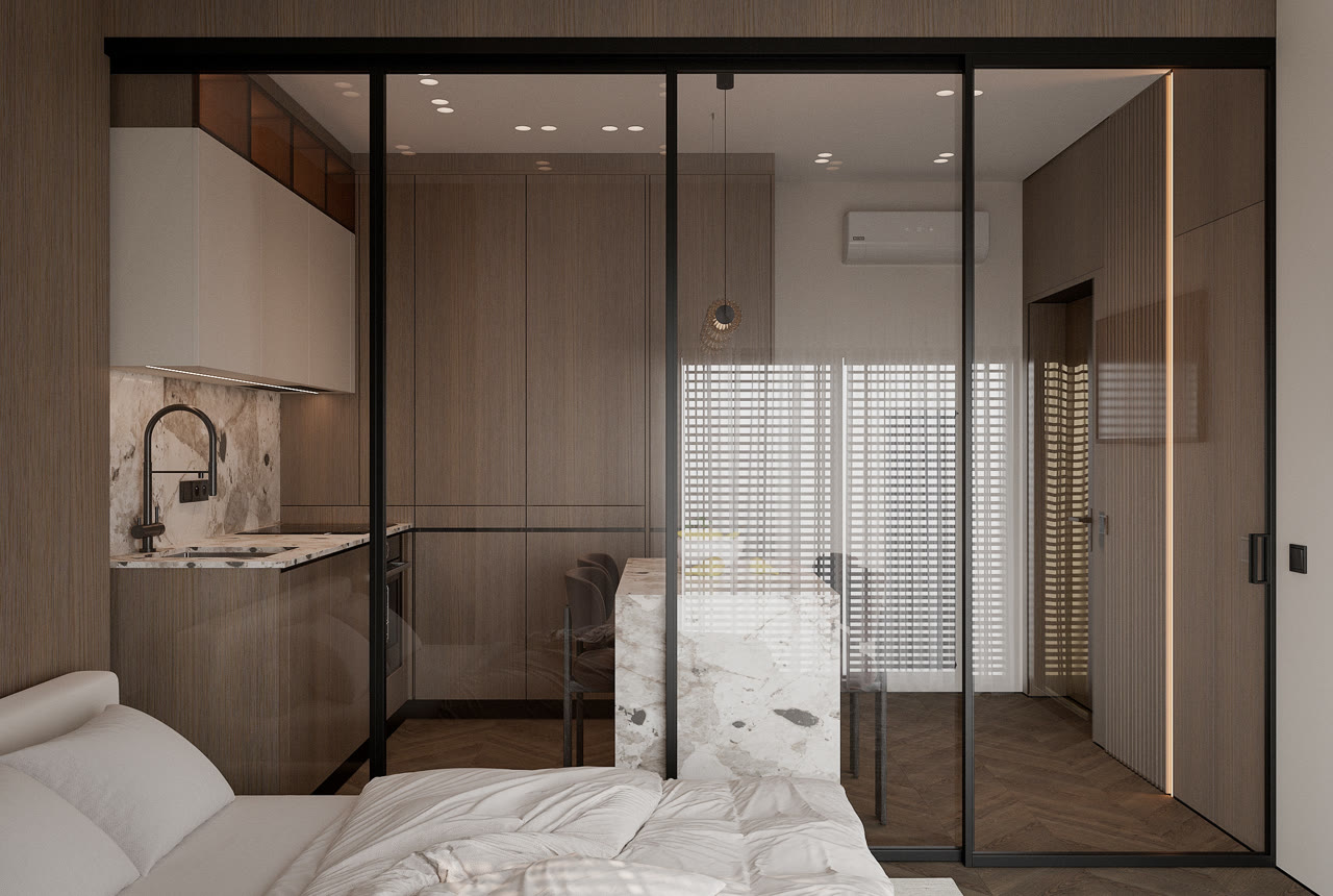 General view: bed, kitchen behind glass partitions and a window